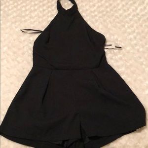 Black romper - never worn still has tags on it
